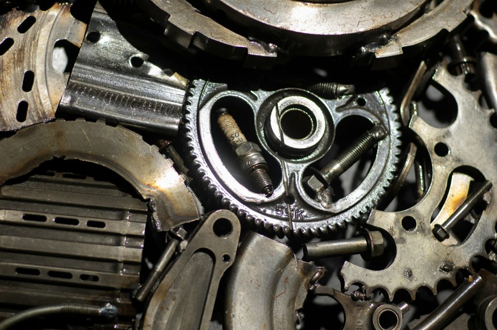 Engine belt drive assembly featuring pulleys and tensioners as automotive manufactured parts. This close-up view of an engine belt drive assembly illustrates how automotive manufactured parts such as pulleys, belts, and tensioners are engineered to meet reliability, safety, and performance standards demanded by global OEMs.