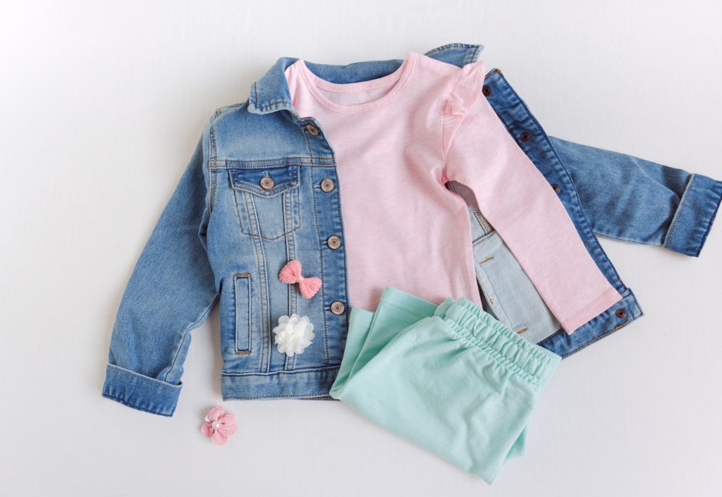 Infant casual outfit produced by Indian clothing manufacturers for children’s apparel brands. A coordinated infant outfit featuring a soft cotton top, denim jacket, and comfortable bottoms, reflecting the versatile children’s apparel production capabilities of Indian clothing manufacturers.