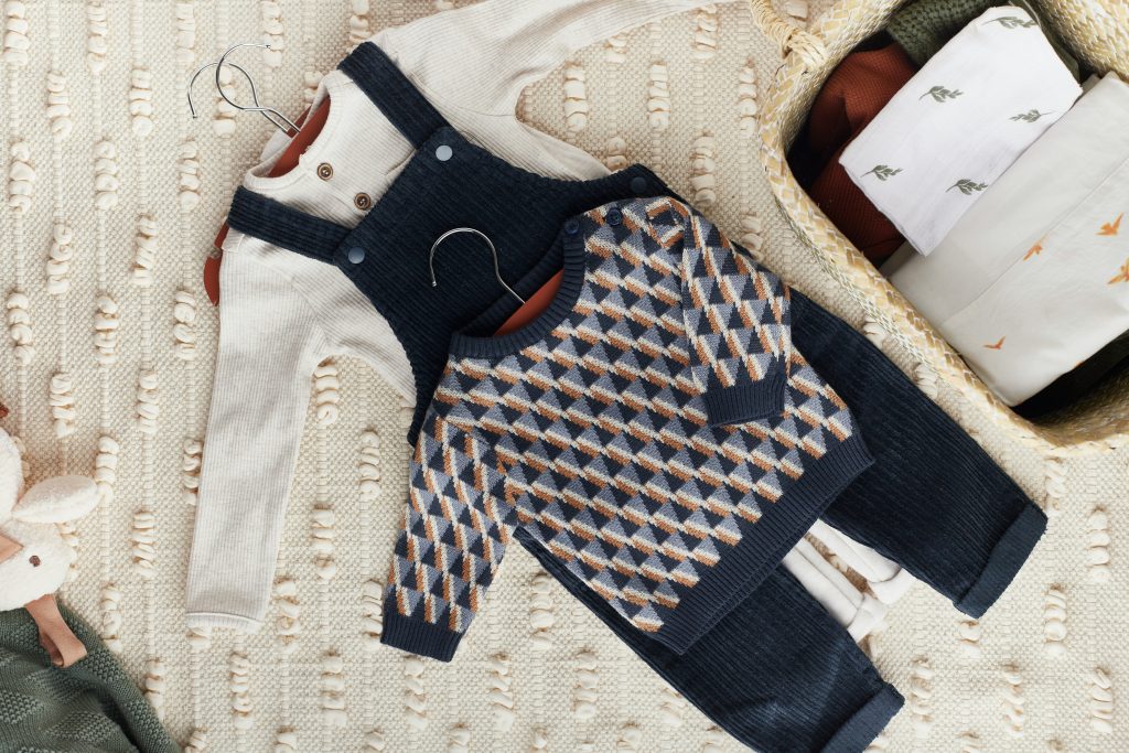 Children’s apparel production using organic fibres and verified kidswear manufacturing. Coordinated kidswear garments made through verified kidswear manufacturing, highlighting organic fibre use, material traceability, and structured children’s apparel production systems.